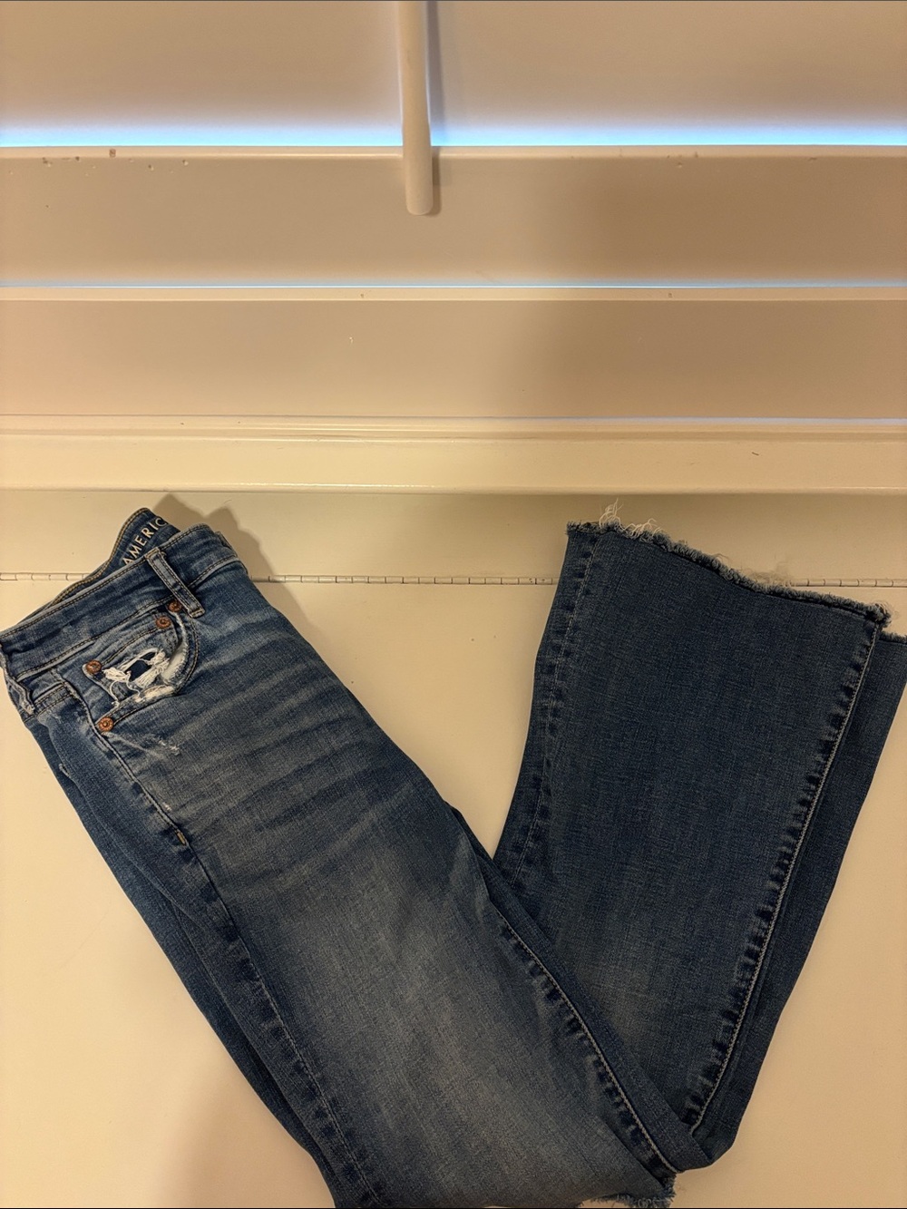 American Eagle Outfitters Blue Flare Jeans with Frayed Hem